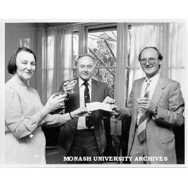 Mrs Frances Maber of Commonwealth Department of Education presenting cheque to Professors John Rickard (Melbourne University) and Peter FitzRoy (Monash), towards establishment of Foundation for Management Development