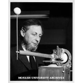 Professor Chris Wallace adjusting computerised 'juggler'