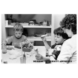 Elwyn Morey Centre teaching assistant Jenny Young with Matthew (left) and Joseph