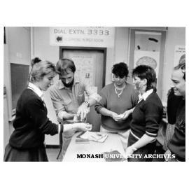 Geoff White demonstrating first aid to students from Mordialloc High School