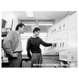Dr Steve Edwards (left) and student Doug Watkins using digitiser to store information