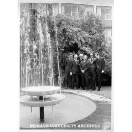 Official opening of fountain in Engineering courtyard. Professor K. H. Hunt (left), Mr John Paxton-Petty, Dr Louis Matheson, Sir Osborne McCutcheon, Professor R. G. Barden, and fountain designer Dr Jon Hinwood