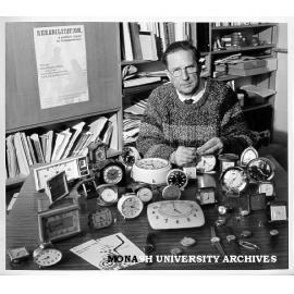 Dr Pierre Gorman, with clocks donated for research