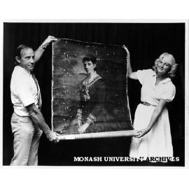 John Drury and Judith Armstrong with mystery portrait