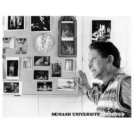 Dr Dennis Bartholomeusz with pictures of Shakespeare productions