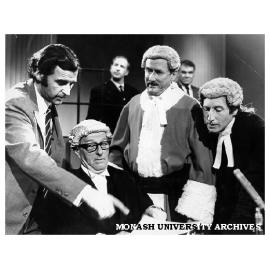 Producer Ian Crawford (left) discussing script for 'According to the Evidence' with actors Keith Eden, Nigel Lovell and Tim Elliott