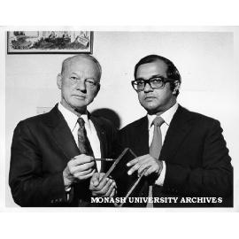 Mr Ken Bennett, CBA bank security manager with Dr Weerasooria and sample of bullet-resistant glass