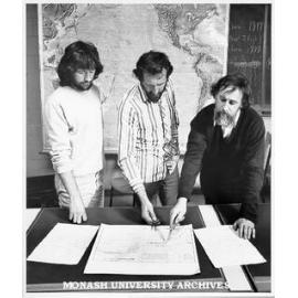 Mr John Grindrod (ANU), and Monash geographers Dr Jim Peterson (centre) and Mr Wally Jenks (right), plotting drift pattern