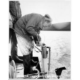 Dr Pat De Deckker with Mackereth sampler on West Basin, near Colac