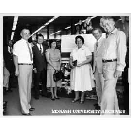 Opening of exhibition 'Oakleigh: Portrait of a New Society'. from left: Cr Mike Schuett, former Monash photographer Herve Alleaume and wife Alix, Cr Olga Jackson, Vice-Chancellor Professor Martin, and Mr Race Mathews, MLA