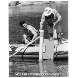 Dr Pat de Deckker (right) and Mr Greg Coomber, testing sediment trap in containment pond