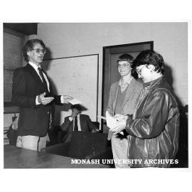 Dr Colin Nettelbeck presenting Alliance Francaise and Liliane Gay Prize to Andrew Pentecost and Anne Kerin