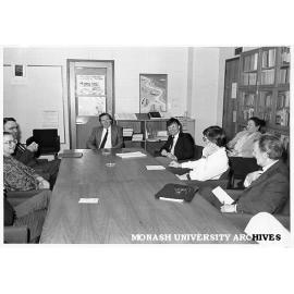 Vice-Chancellor Professor Mal Logan talking with staff