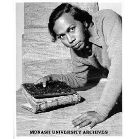 Student Mr Bachamiya Abdul Hussainmiya with manuscripts discovered in Sri Lanka