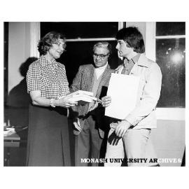 Dirk Strasser receiving Goethe Prize from Dr L. Muller of Office of Consul General of Germany. Professor L. Bodi (centre)