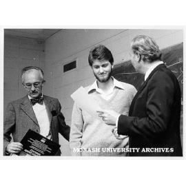 Alistair Craig receiving Goethe Prize from Consul General of Germany Dr Karl-Heinz Scholtyssek, Associate Professor Walter Veit at left