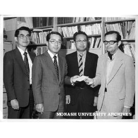 Professor J. Neustupny, chairman of Japanese department, receiving cheque from Mr M. Inukai of Toyota Motor Company