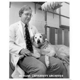 Dr Glenn Bowes and dog Sophie, trained to fall asleep in lab