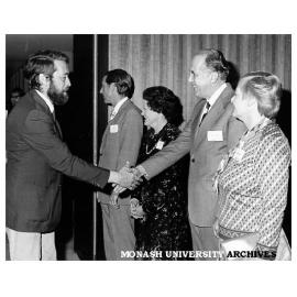 Professor Ian Polmear (right) and Mrs Polmear, greeting Mike Duesbury of National Research Council of Canada at reception for delegates to ICSMA conference