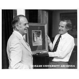 Emeritus Professor Rod Andrew presenting Russell Drysdale painting 'Study for Maria' to Vice-Chancellor Professor Ray Martin