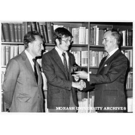 Professor Karol Morsztyn, with son Ron receiving his A. H. Robins Award from Professor Rod Andrew