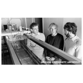 Professor Bruce Morton (left), Dr Roger Smith and Dr David Karoly examining laboratory flow tank