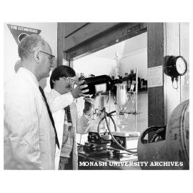 Drs Fred Copp (right) of Pharmacology, and John Cullen of Chemistry, working on joint project