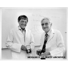 Professor Alan Boura (right) and laboratory manager Ian MacFarlane with Queen's Awards for Technological Achievement