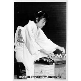 Japanese musical expert Ms Satsuki Odamura playing kotu at performance in Robert Blackwood Hall