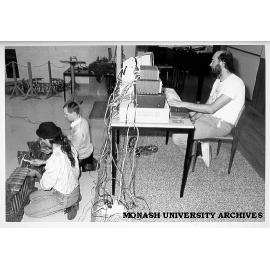 Composer-in-Residence Warren Burt at computer keyboard