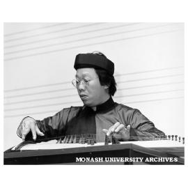 Vietnamese music scholar Tran Quang Hai playing dan trang