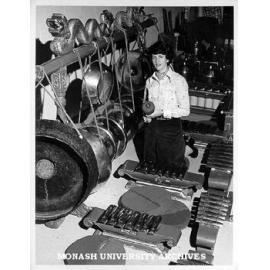 Veronica Rosier with display of ethnic instruments