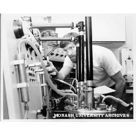 Laboratory manager Ian Ray with fermenter used for growing bacteria