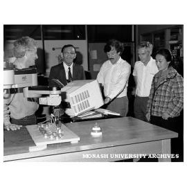 Dr Peter Dransfield (left) and Professor Stuart Dickinson (second right) in Control and Automation Laboratory with visitors Professor Ryoichi Ichimiya, Dr Reg Dunlop, and Ms Ding Yan