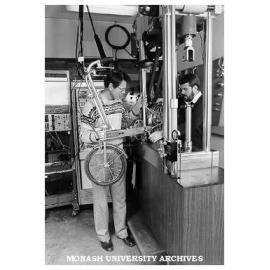 Senior lecturer Dr John Griffiths and laboratory assistant Mike Johnstone, testing bike for fatigue