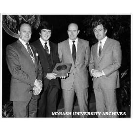 Greg McPhee (second left) winner of J. W. Dodds Memorial Medal, with from left: Professor Lance Endersbee; general manager of Clyde-Riley Dodds, Mr Gordon Page; and chairman of Mechanical Engineering Professor Bill Melbourne