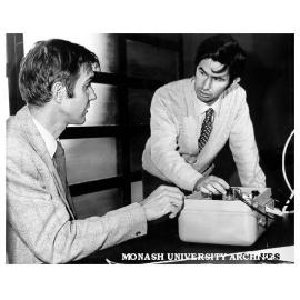 Jon Hinwood and Des Mills, taking readings from temperature salinity metre