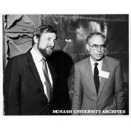 Mr Charles Ambrose with Senator Gareth Evans in front of heat exchanger at APPM mill in Ballarat