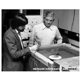Dr Logan Francey (right) and student Peter Golding testing heat retention properties of pool blanket