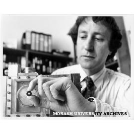 Dr John Pilbrow with 'loop gap resonator'