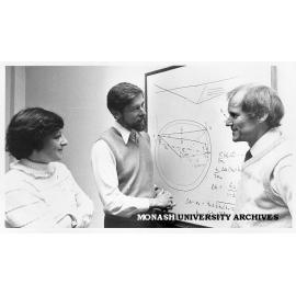 Professors Susan Town (left), John Cashion (right) and Associate Professor Fred Smith discussing neutron diffraction