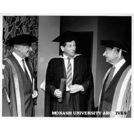 Honorary graduate, Science photographer Mr Bruce Fuhrer with Governor Dr Davis McCaughey (left) and Chancellor Sir George Lush (right)