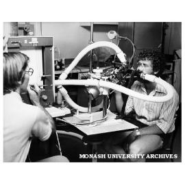 Dr Rod Westerman (left) with student Dennis Hatcher breathing into spirometer