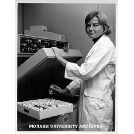 Technical assistant Jill Duncan placing plasma samples in liquid scintillation spectrometer