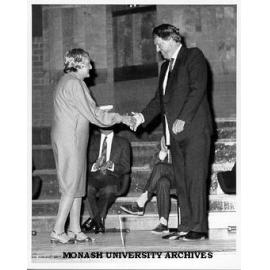 Professor Mollie Holman receiving ANZAAS Medal from Sir Edmund Hillary at opening session of the ANZAAS Festival of Science, August 1985