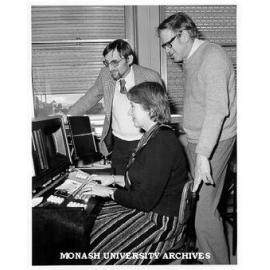 Professor Jiri Marvan (left), Associate Professor Gavin Betts and Mrs Lois Osborne working on translation of 17th century Latin-Czech grammar