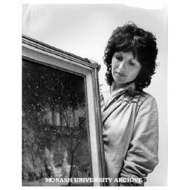 Art historian Ms Helen Topliss with early Tom Roberts painting from Monash collection