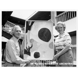 Deputy Vice-Chancellor Professor Kevin Westfold with artist Peggy Perrins Shaw and painting to be exhibited in The Age Gallery