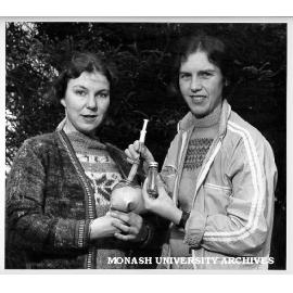 Research assistant Sue Costain (left) holding bladder containing acetylene for botanist Dr Ann Lawrie