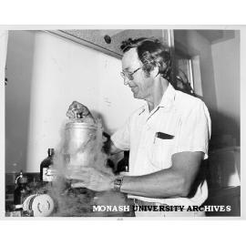 Dr George Ettershank freezing insect specimens in liquid nitrogen